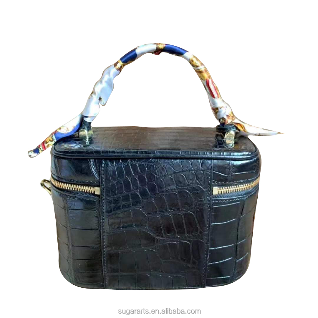 The black Cosmetic bag for  women Cowhide inner material Nile alligator embossed  leather handbag