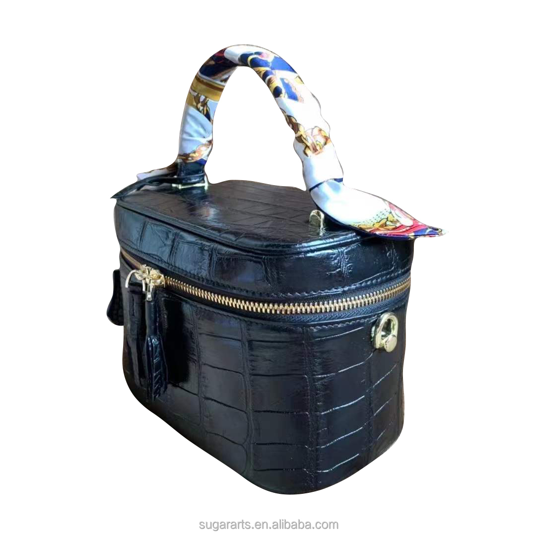 The black Cosmetic bag for  women Cowhide inner material Nile alligator embossed  leather handbag