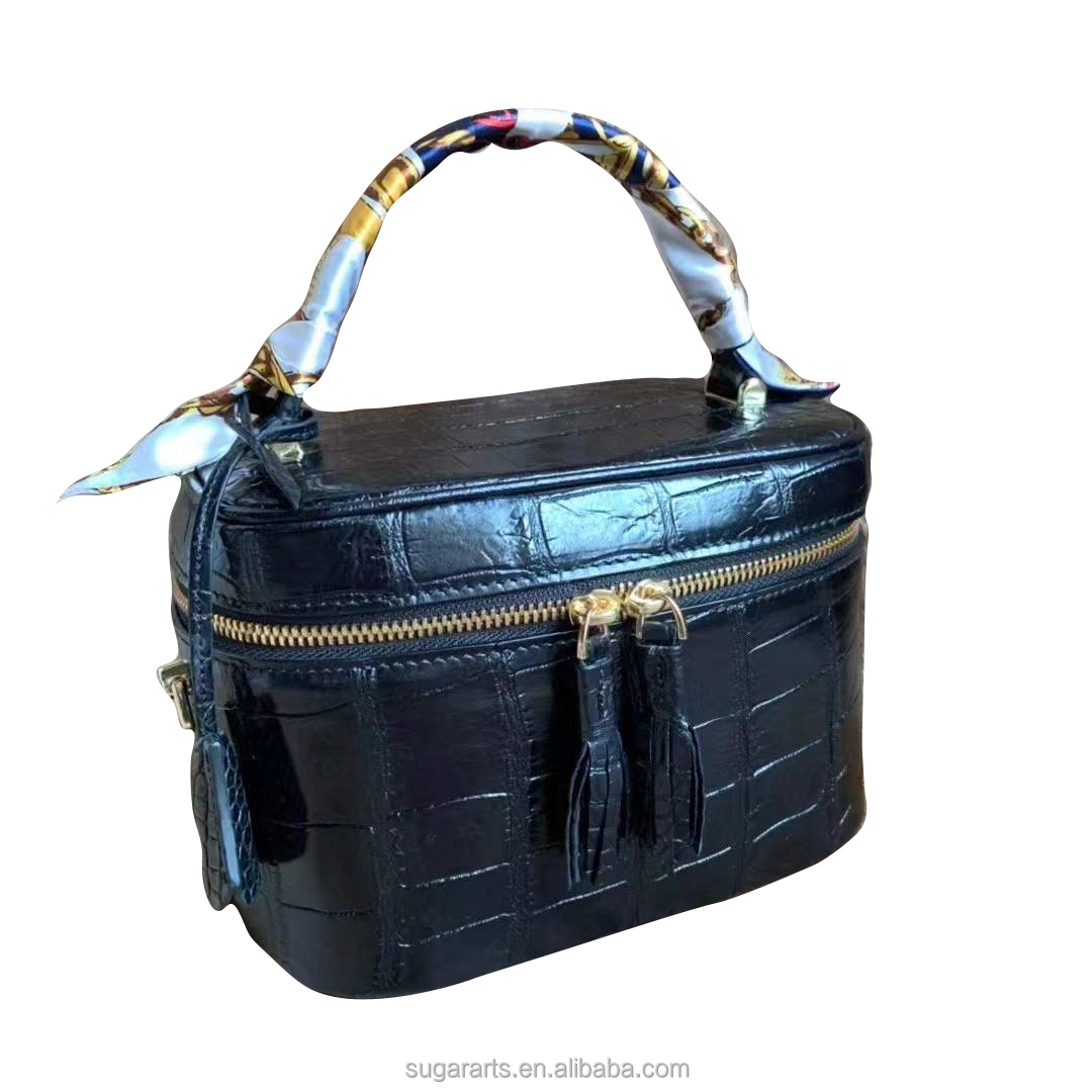 The black Cosmetic bag for  women Cowhide inner material Nile alligator embossed  leather handbag