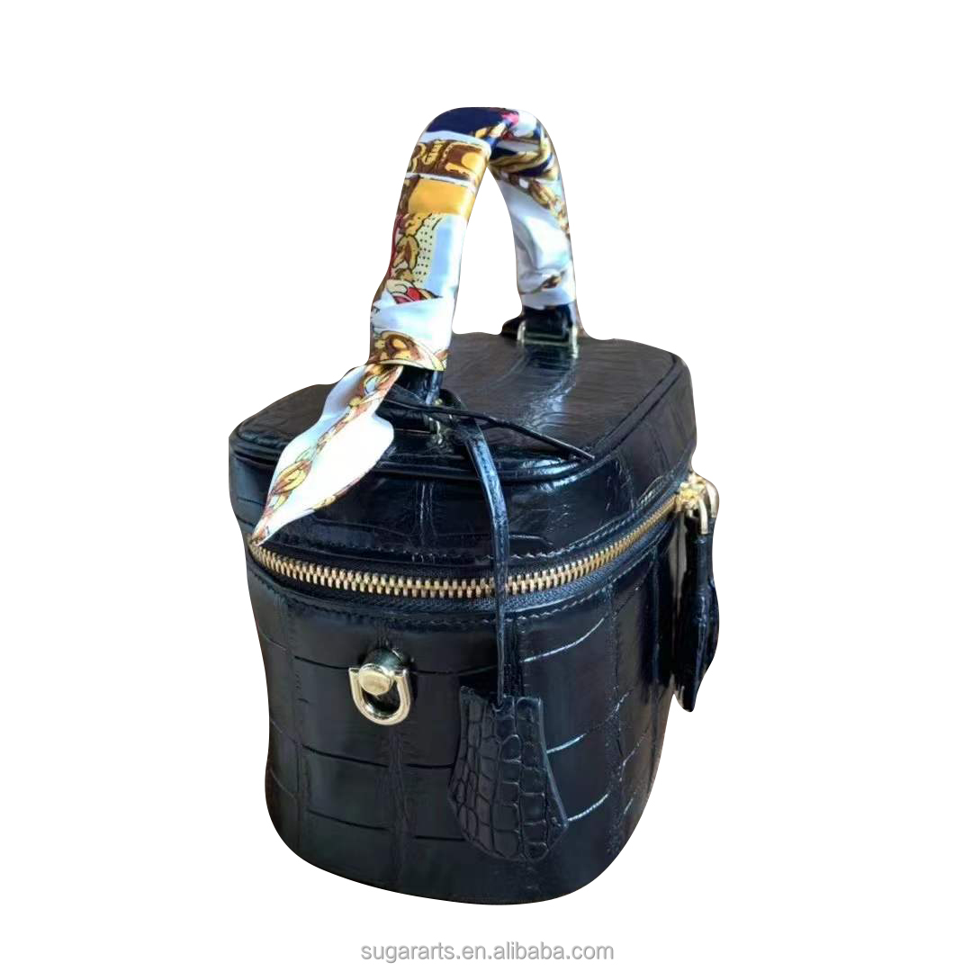 The black Cosmetic bag for  women Cowhide inner material Nile alligator embossed  leather handbag